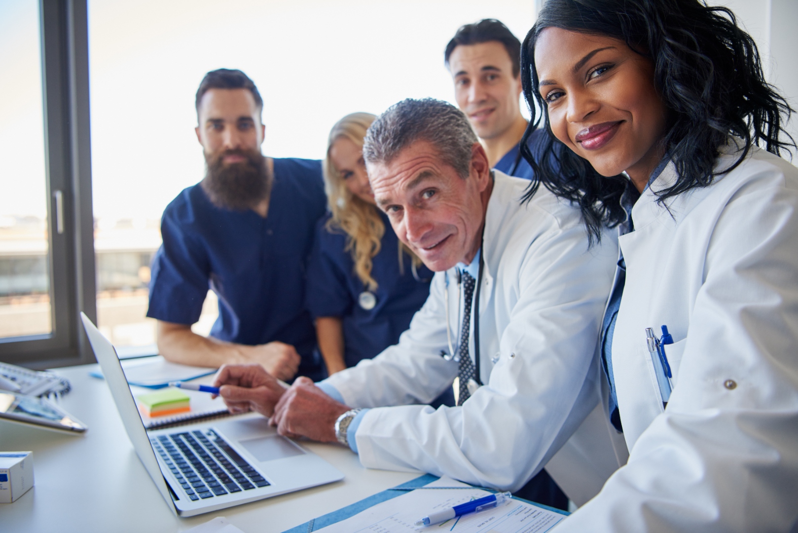 Healthcare team reviewing technology during onsite setup